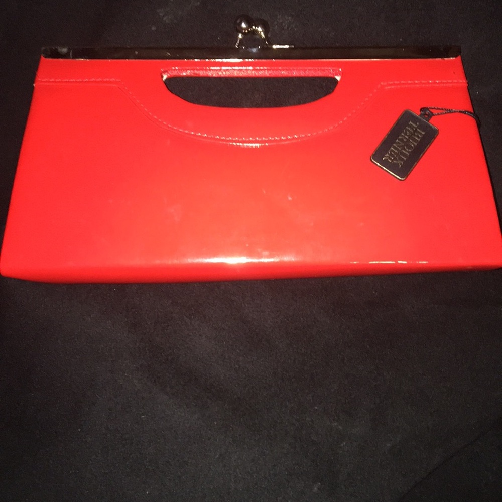 Red patient leather clutch